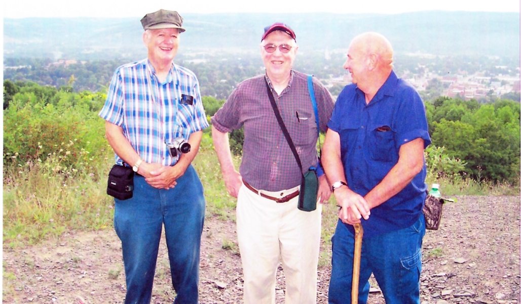 Left to right:  Stan White, Harry Winter and Harris Manwarren, at the face of the stone quarry, Aug. 12, 2010, taken by Don Windsor.